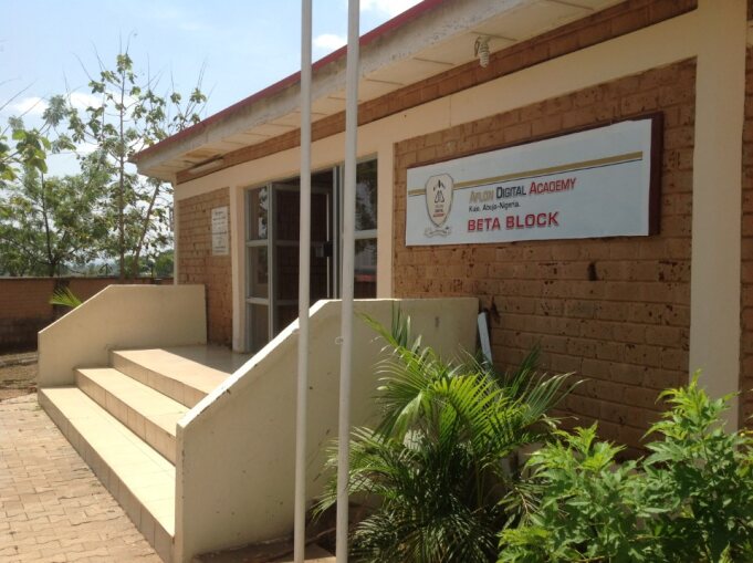 Students collaborating in Aflon Digital Academy classroom